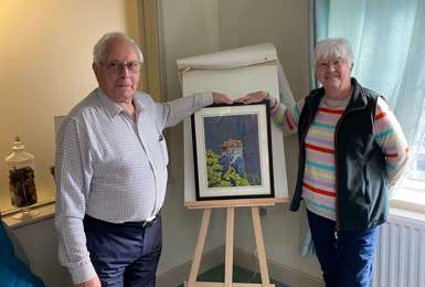 Moat Park Resident Ken raffles hand painted artwork for Ukraine appeal